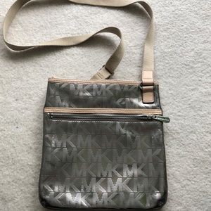 Authentic silver metallic Michael Kors purse.